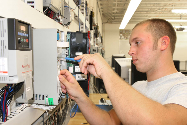 Industrial Maintenance student working on project
