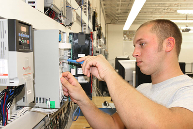 Industrial Maintenance student working on project