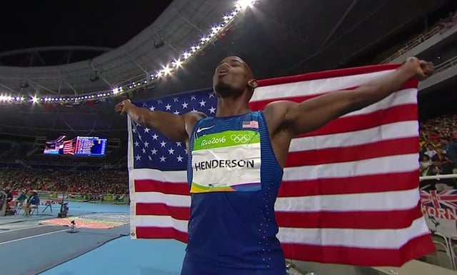 Henderson_at_Olympics_w_flag_7157.png